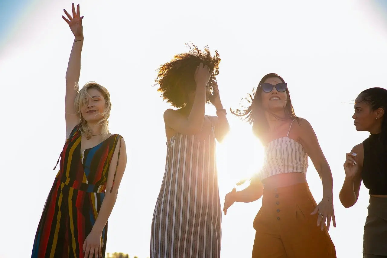 Women celebrating at an outdoor hen party with a chic boho theme