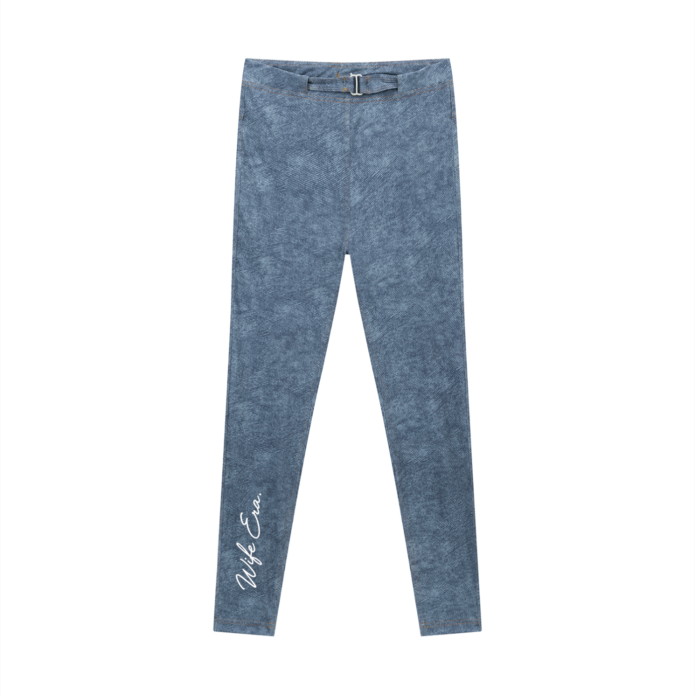 A pair of slate blue leggings with a subtle mottled texture, featuring a matching fabric belt with a silver buckle at the waist and a white script logo on the lower left leg, displayed against a solid white background.