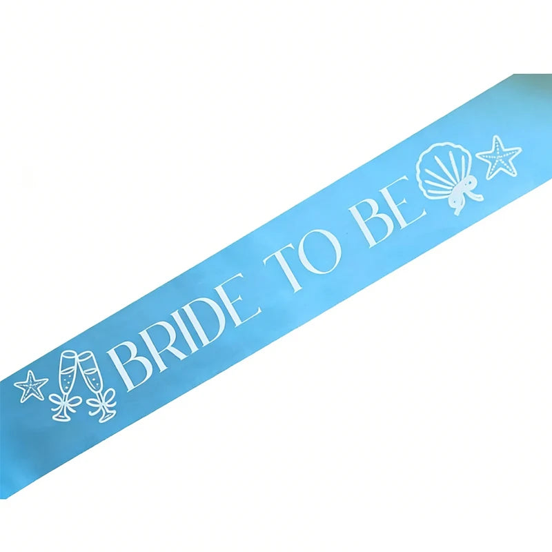 Blue sash with 'Bride to Be' text and beach-themed graphics on a white background