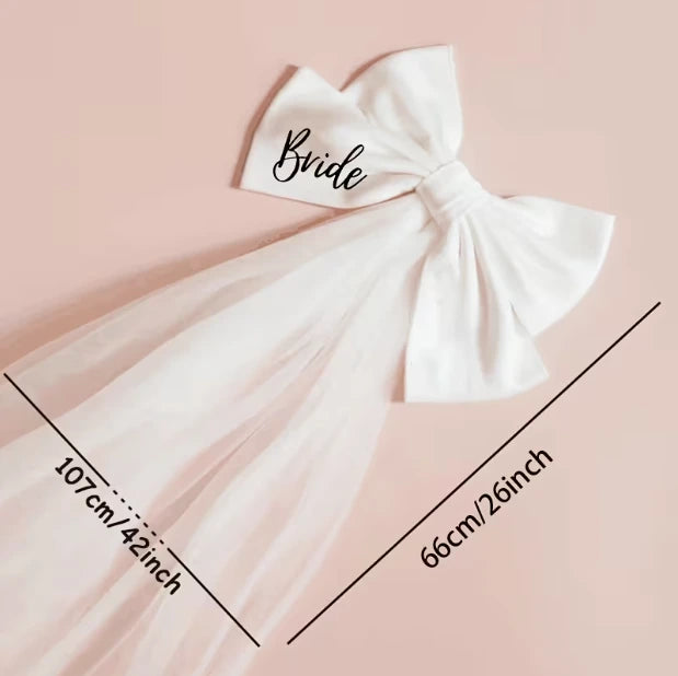 White headband with 'Bride' text on a pink background with measurements