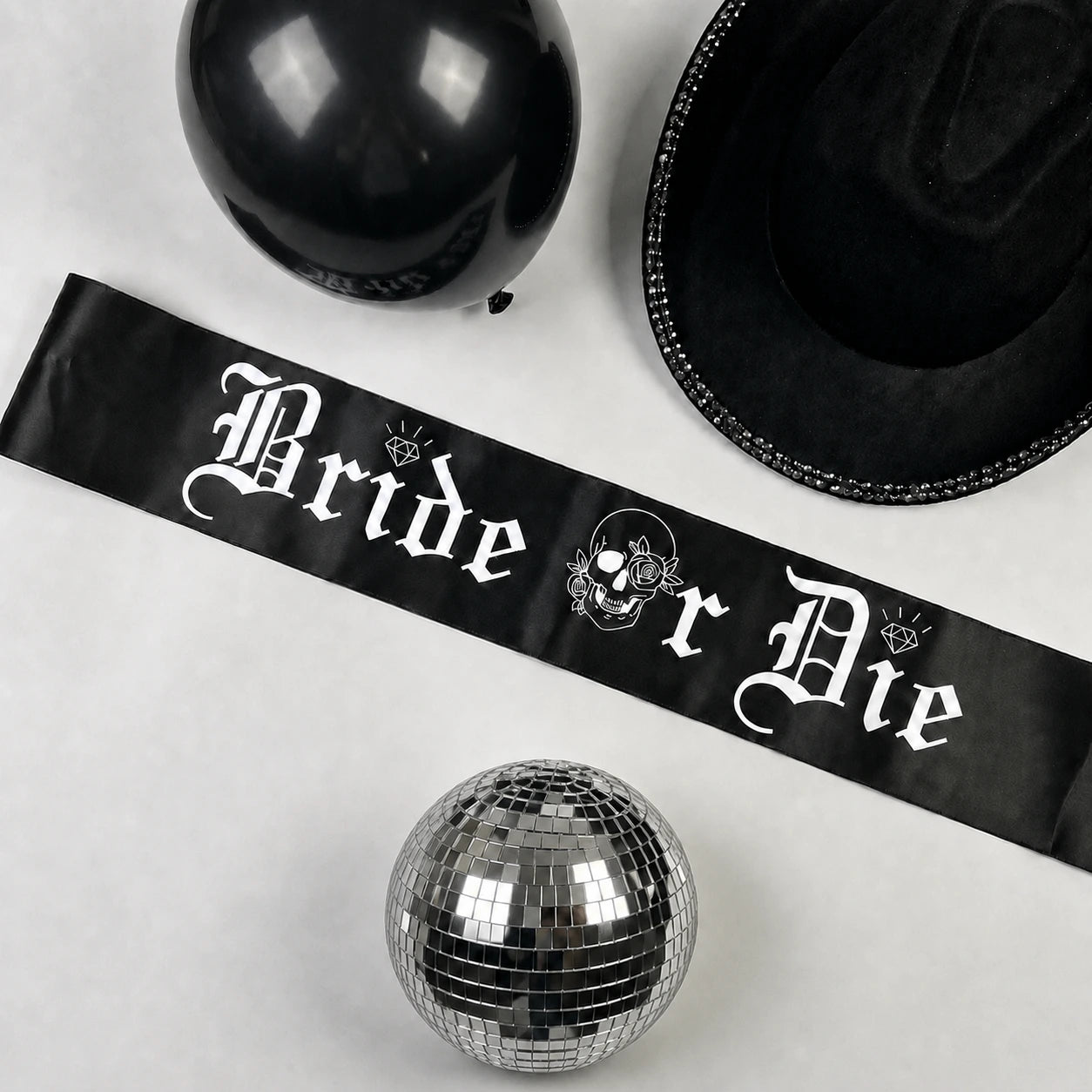 Black sash with 'Bride or Die' text, black balloons, and a disco ball on a white background