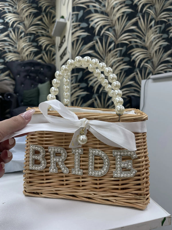 Bride wicker basket with pearl handle, white bow, and pearl embellished lettering