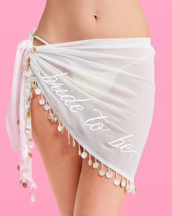 White bride to be sarong with pearl trim for bachelorette beach trip or pool party