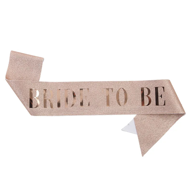 Rose gold sash with 'Bride to Be' text on a white background