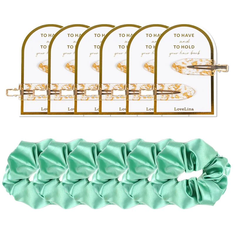 Set of mint green hair accessories for bridesmaids including clips and scrunchies on a white background