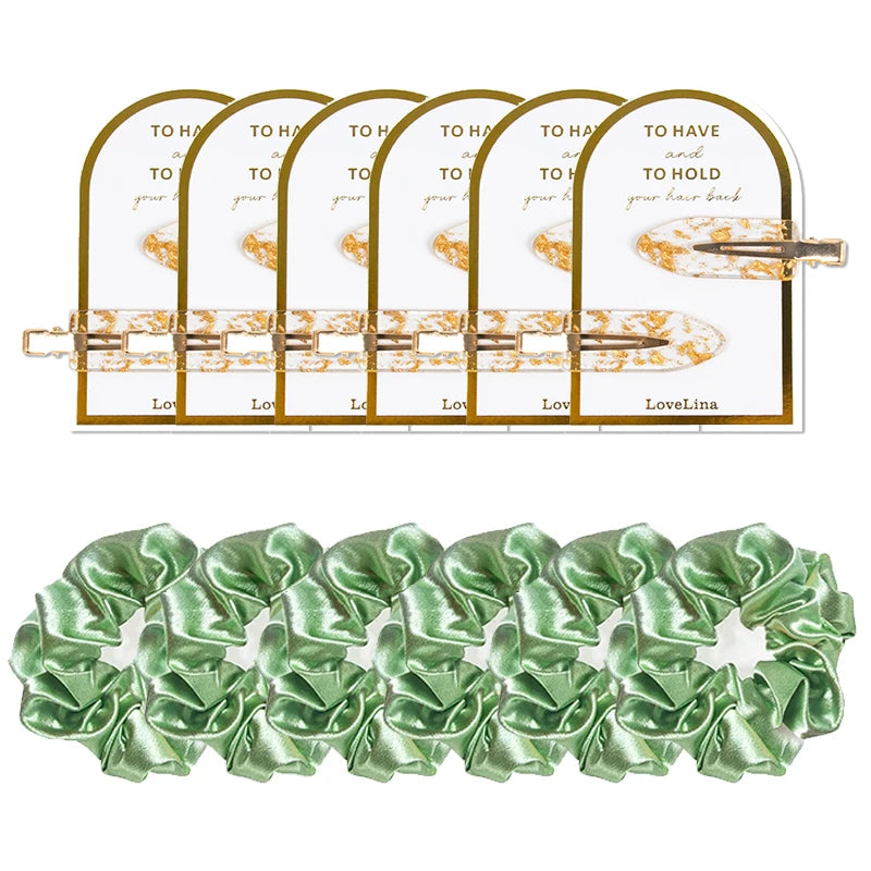 Set of sage green satin hair ribbons with a gold hair clip on a white background for bridesmaids