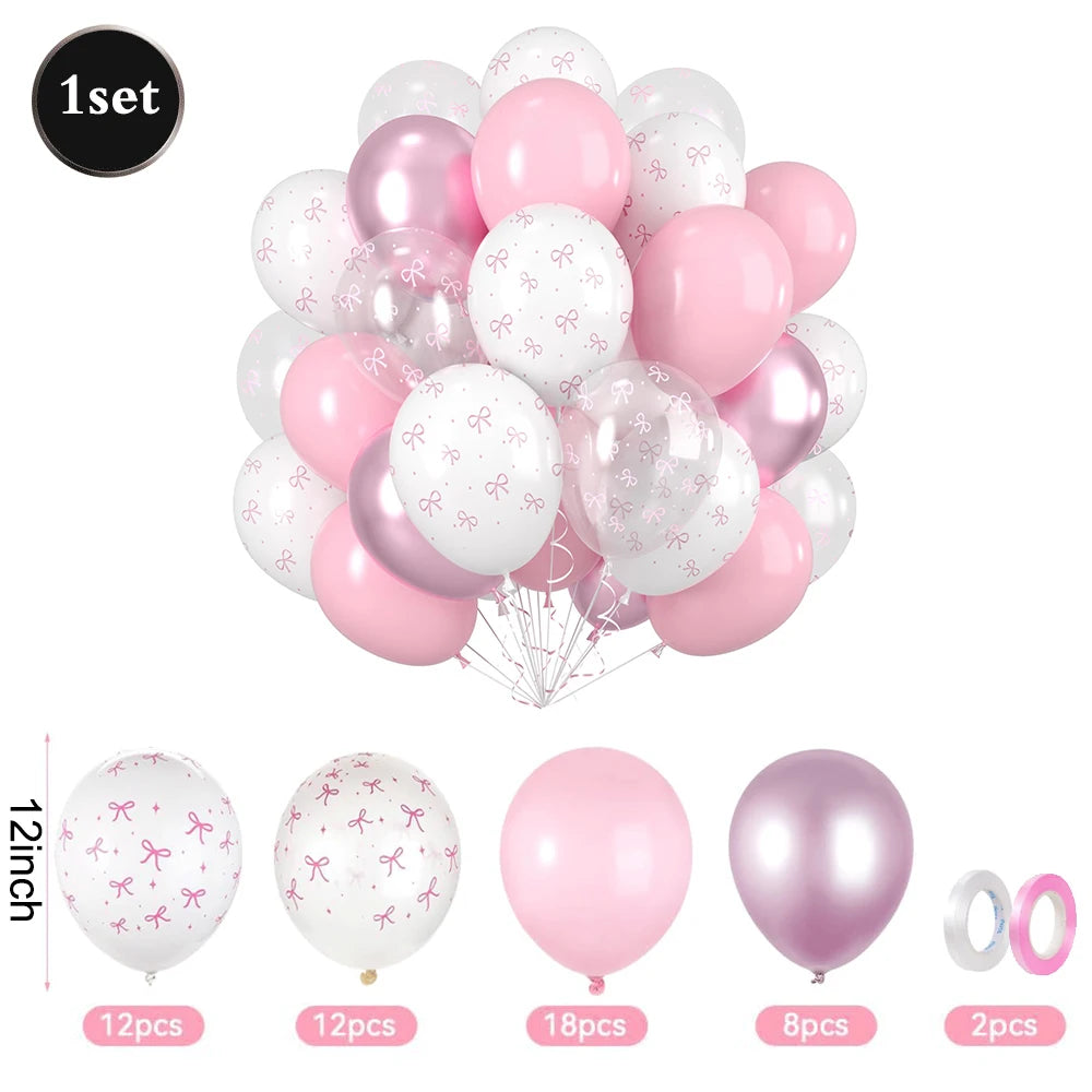 Set of pink, white, and clear balloons with decorative ribbons on a white background.