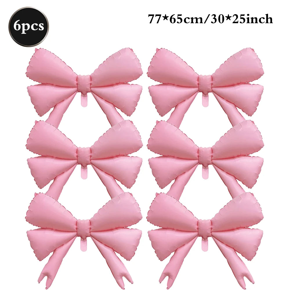 Six pink bow hair clips arranged in a 2x3 grid on a white background, with a black circular badge reading '6pcs' and size text '77*65cm/30*25inch' at the top.