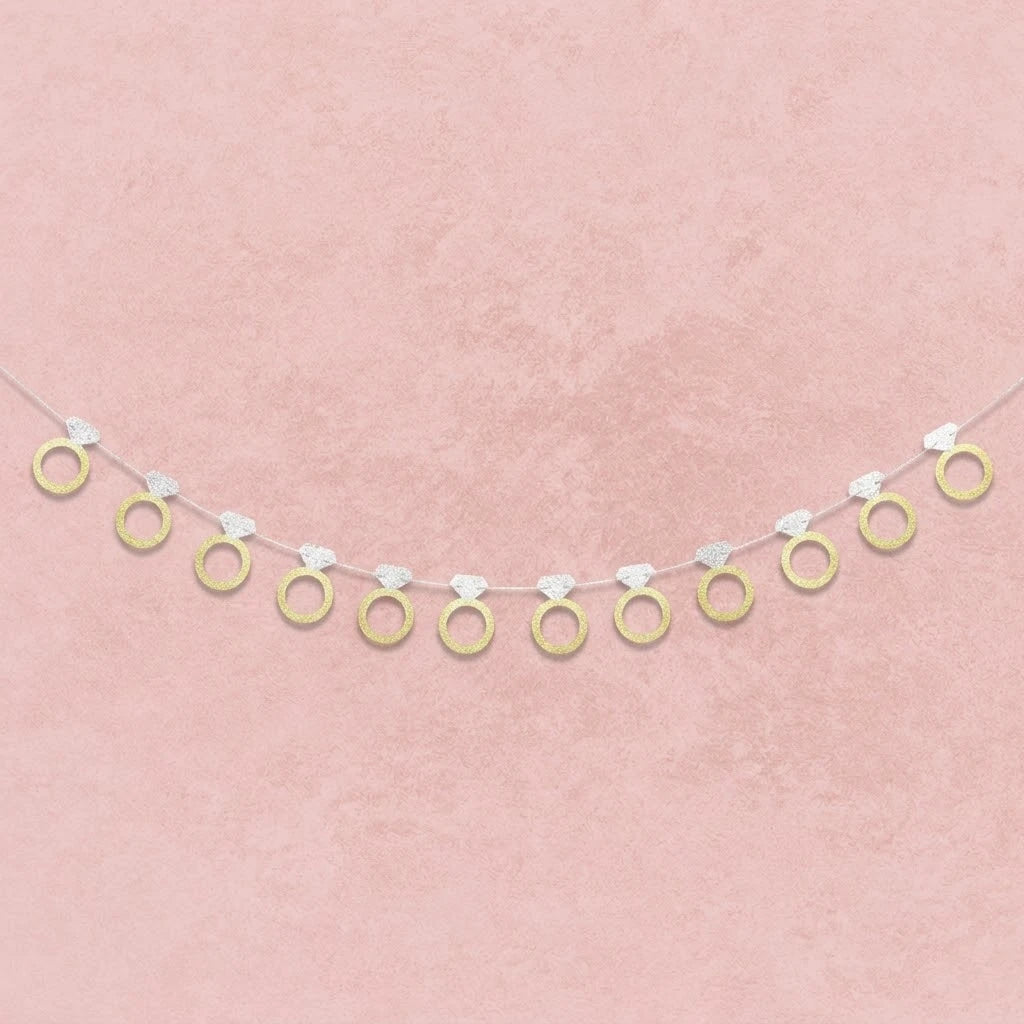 Decorative banner with gold rings on a pink background