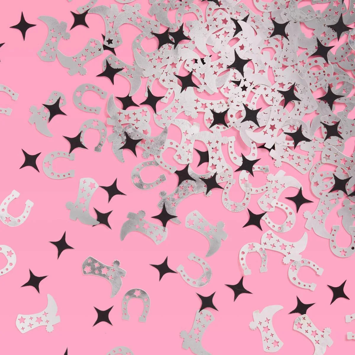 Pattern of horseshoes and stars on a pink background