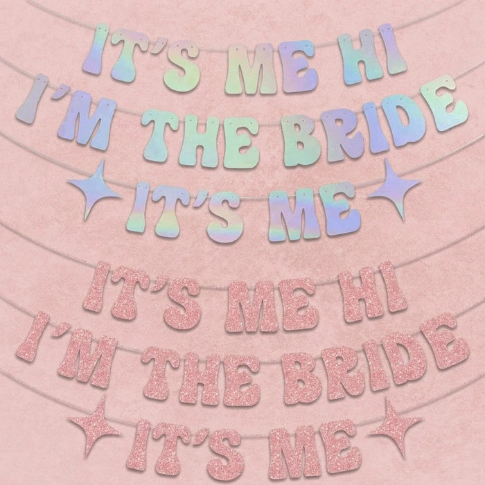 Bridal shower banner with 'It's Me I'm the Bride' text on a pink background