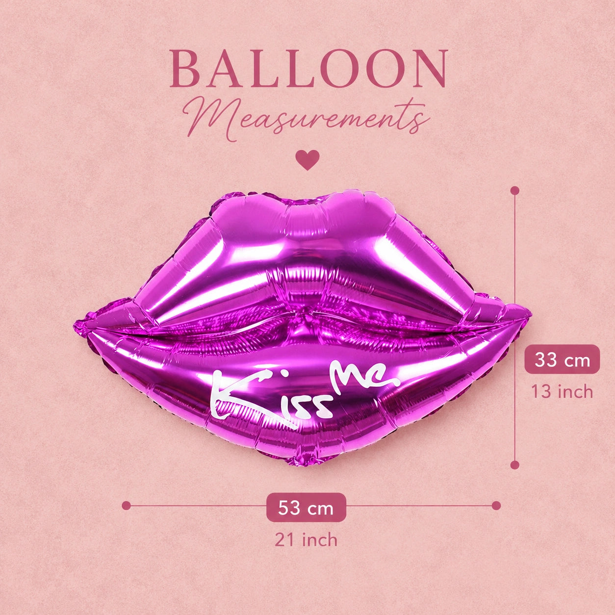 A metallic magenta balloon shaped like lips with the words 'Kiss Me' written across it, shown on a pink background with measurement lines and text indicating 53 cm width, 33 cm height, and 21 inch conversions.