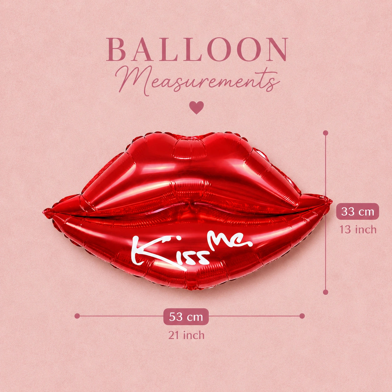 A glossy red lips-shaped foil balloon with white script reading 'Kiss Me' on a pink background, with measurement labels showing 53 cm wide and 33 cm tall.