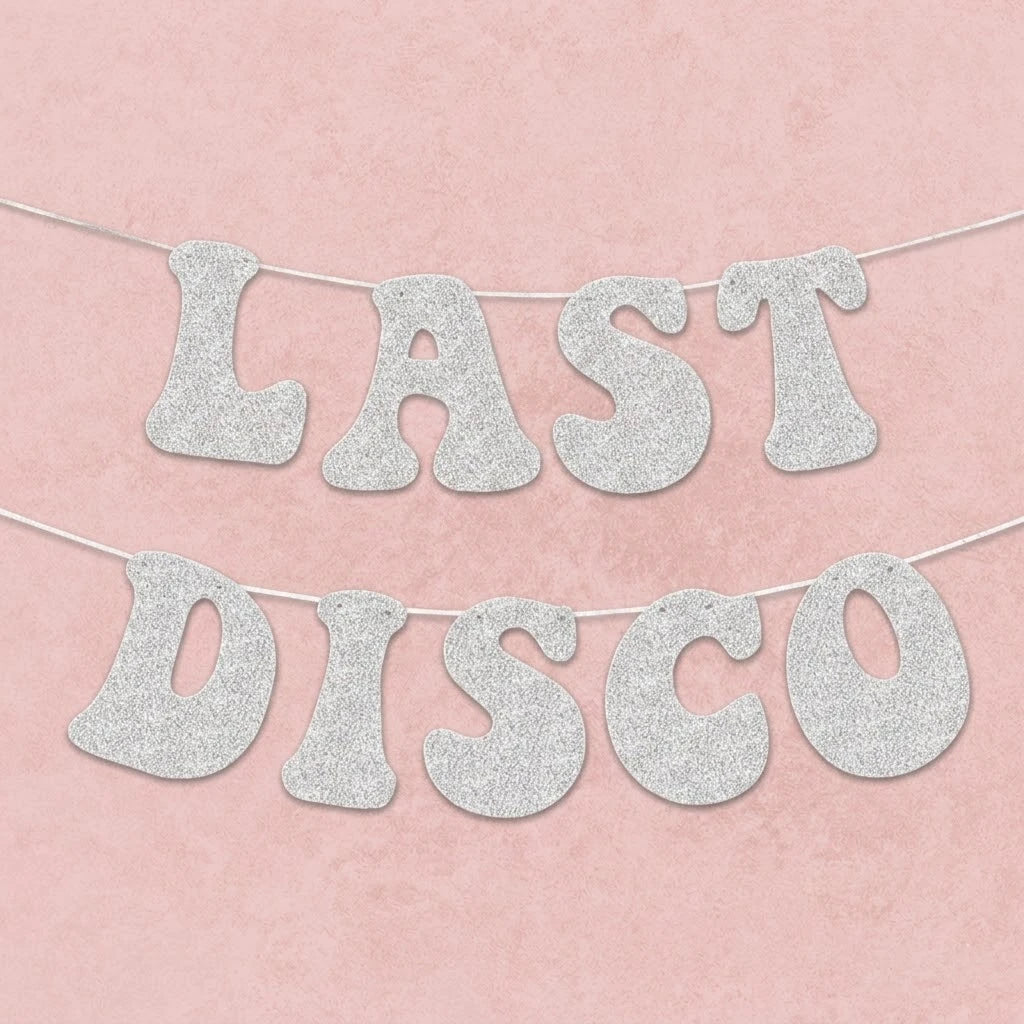 Silver glittery 'LAST DISCO' banner on a pink background