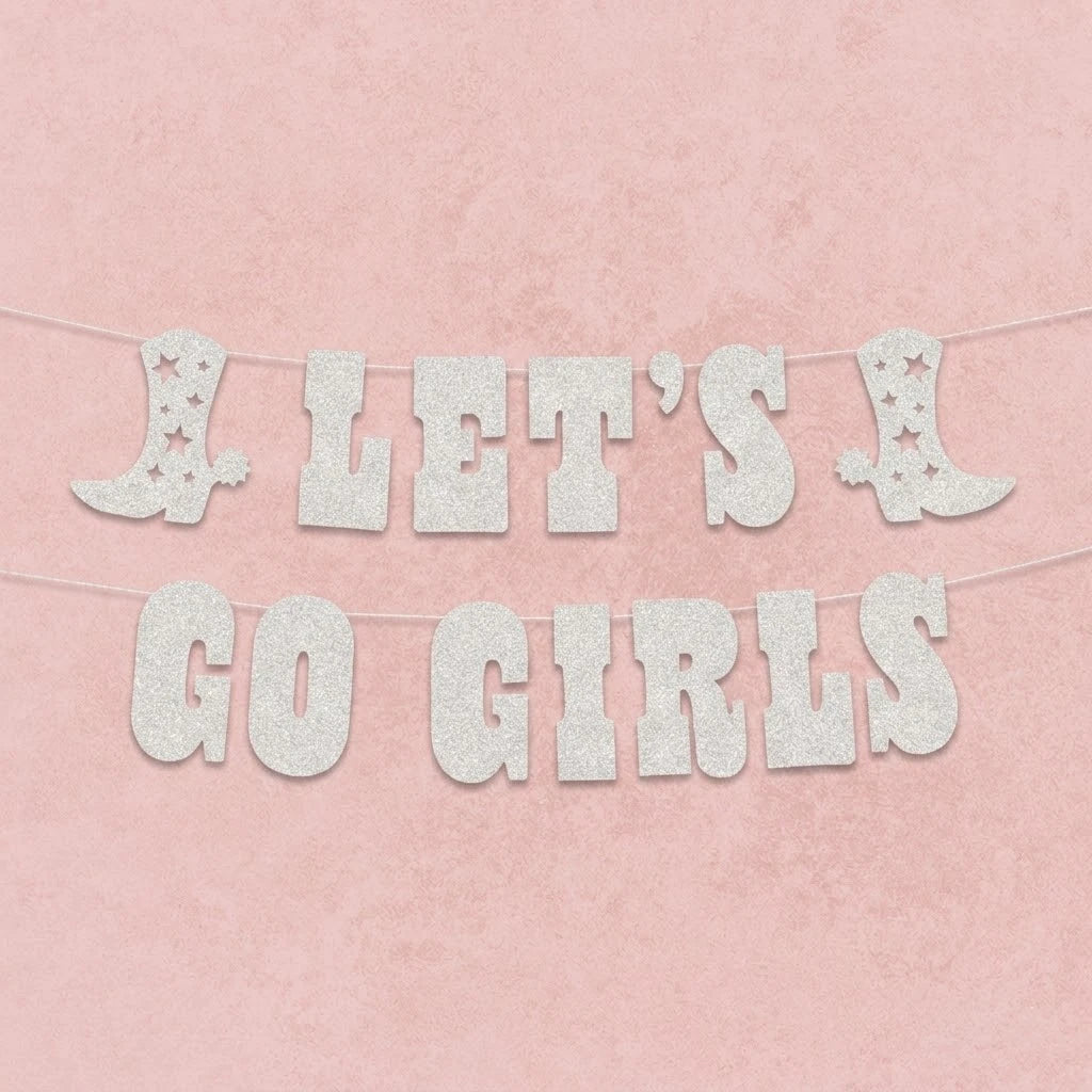 Glittery 'Let's Go Girls' banner on a pink background