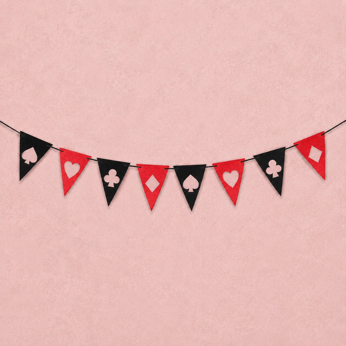 A string of red and black triangular pennant flags with white playing card suit and heart diamond symbols, displayed against a textured light pink background.