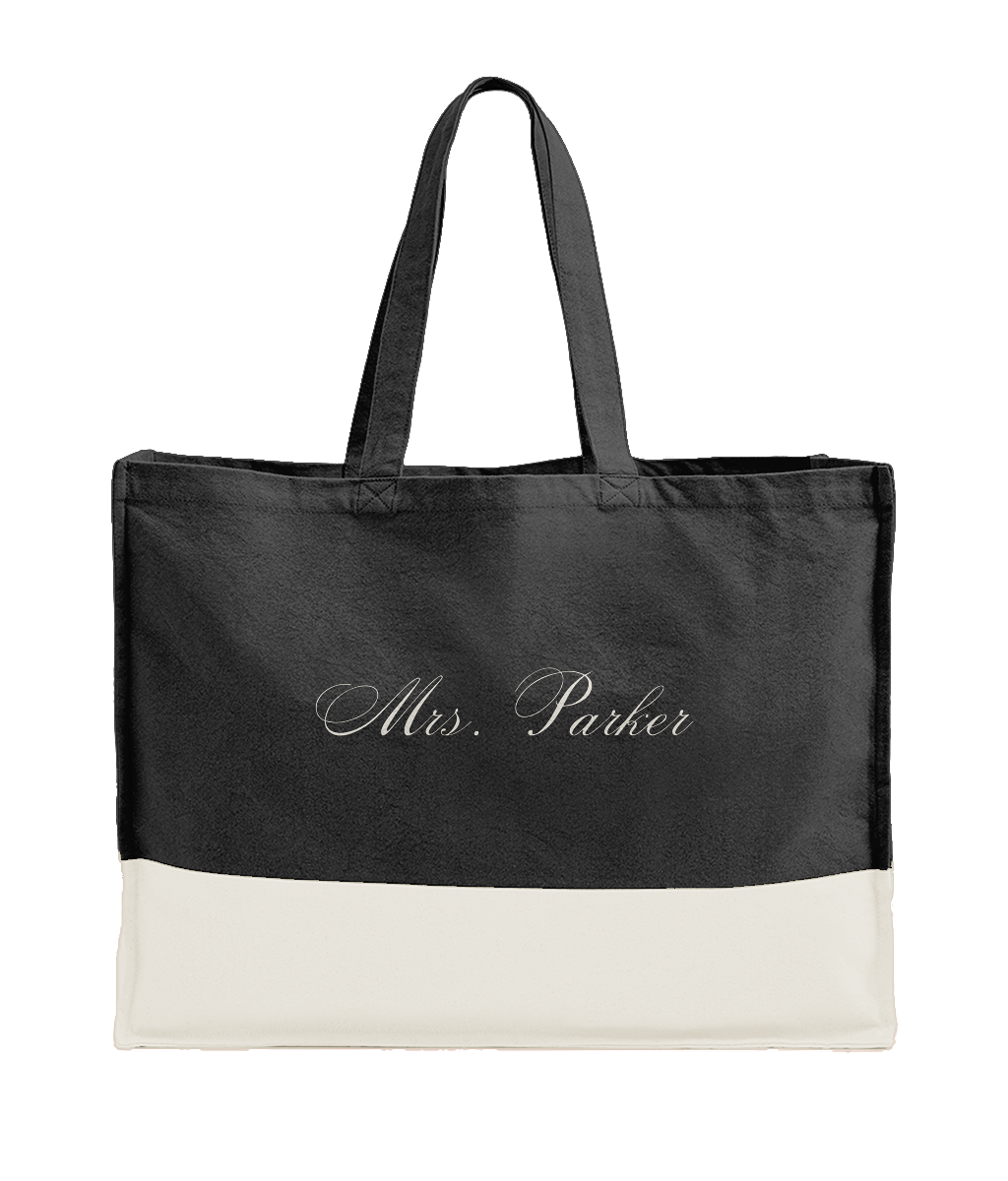 Black and white tote bag with 'Mrs. Parker" personalised text on a white background