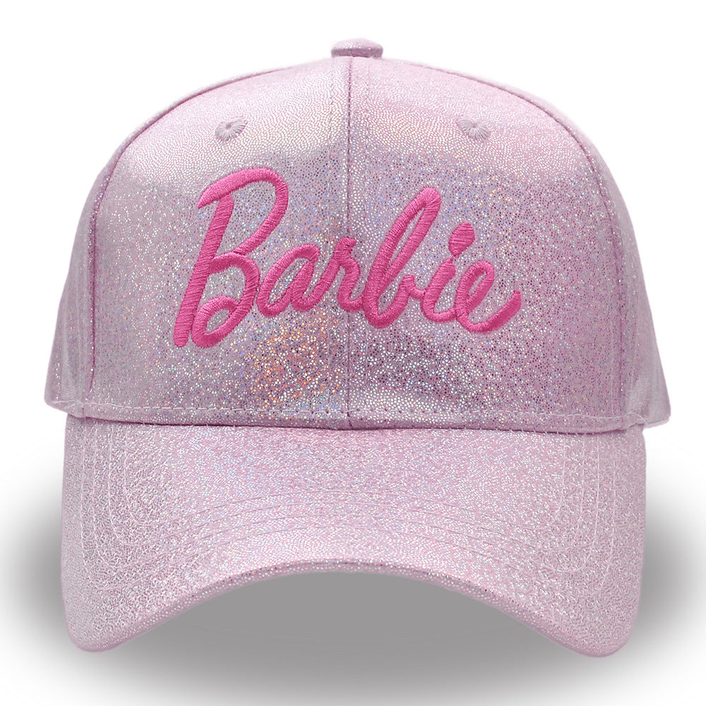 Pink glittery cap with 'Barbie' embroidery on a white background