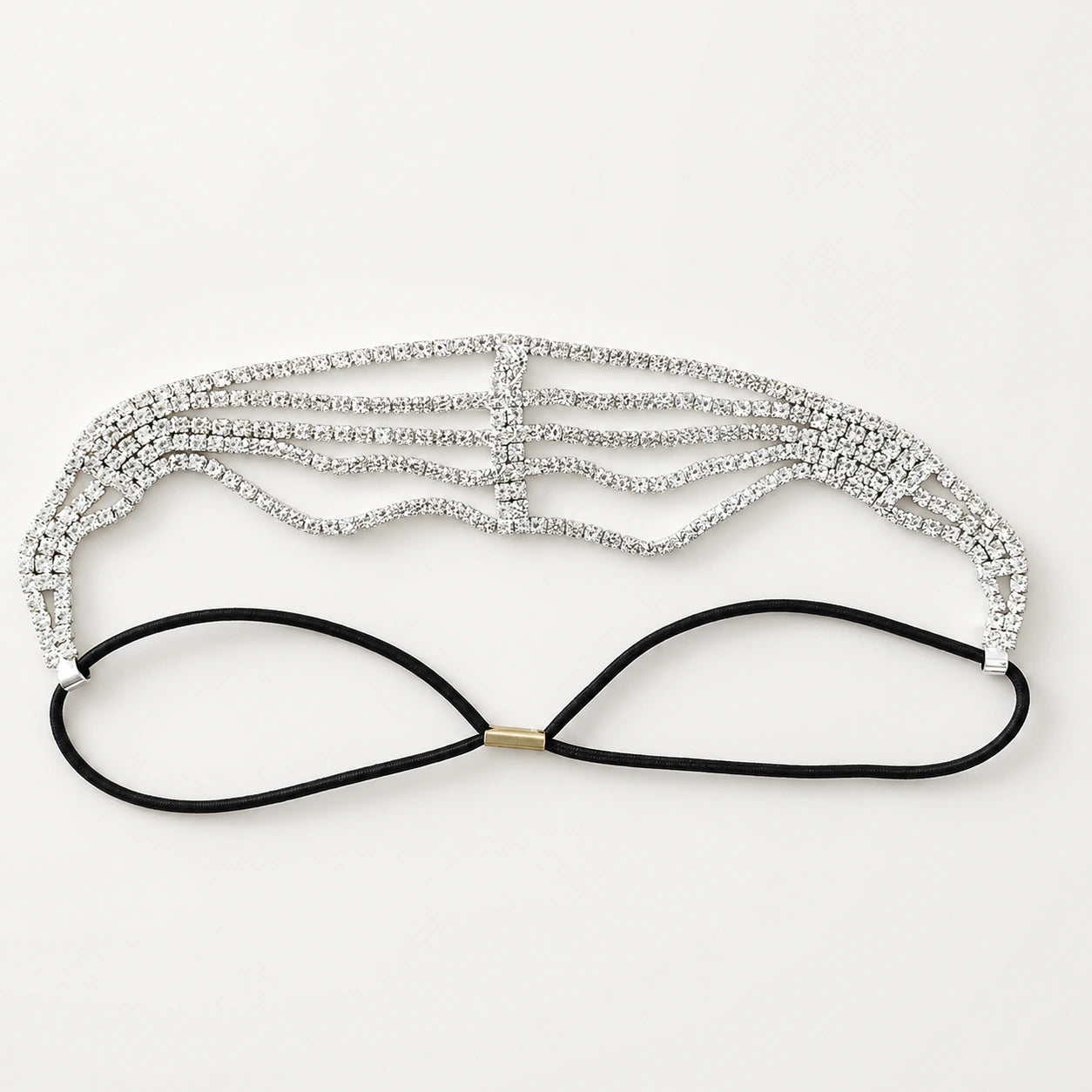 Silver headband with rhinestones on a white background