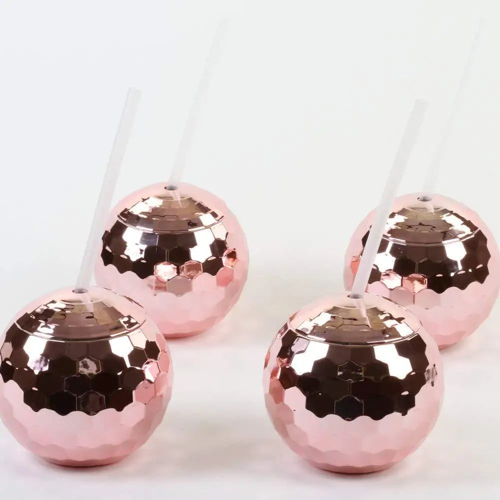 Rose gold disco cups with honeycomb patterns on a white background