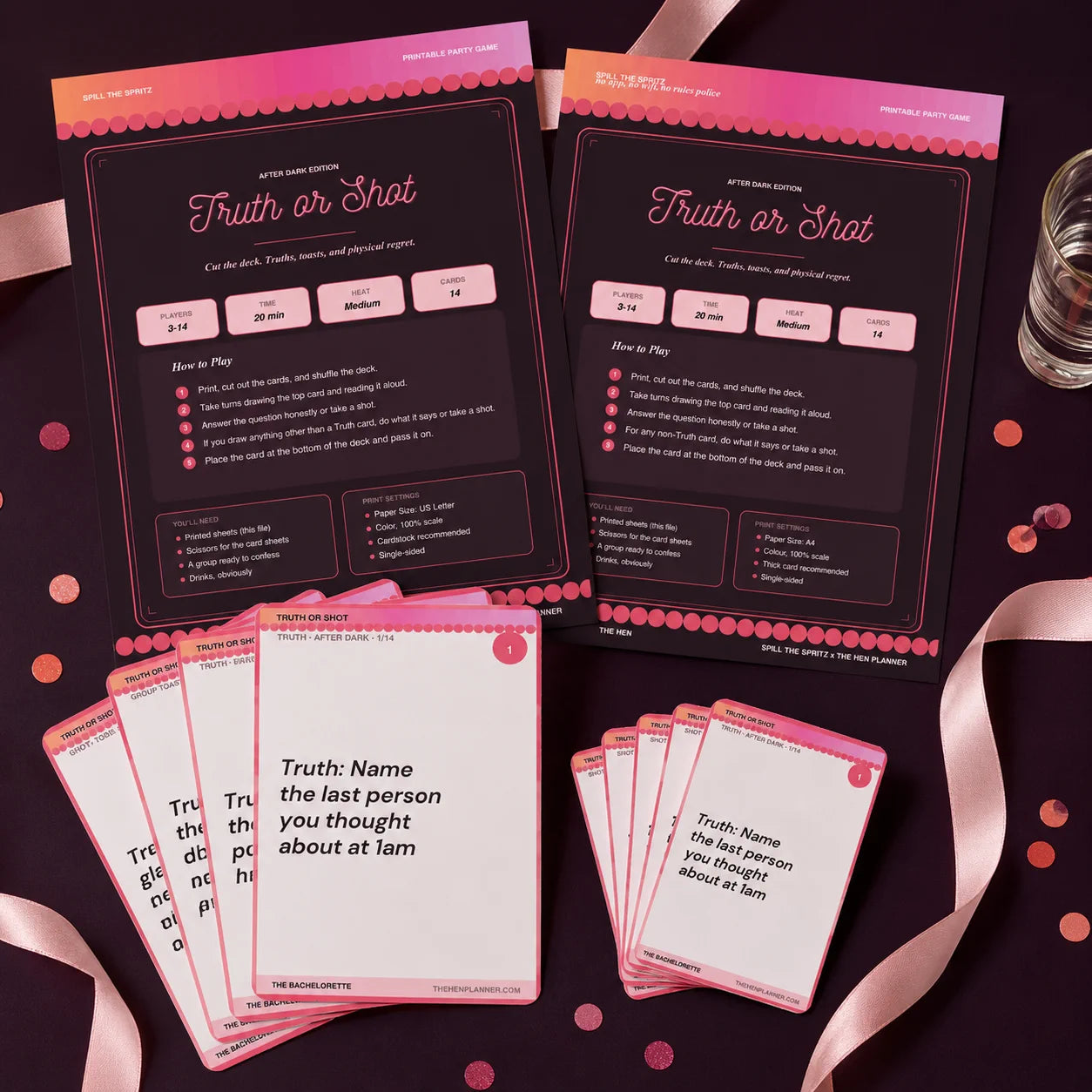 Two printed game cards titled "Truth or Shot" arranged on a dark surface with several pink-edged cards fanned out in front.