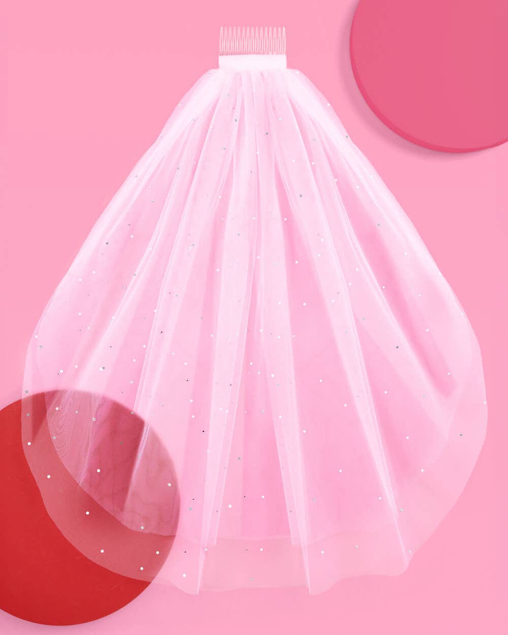 White tulle veil with a pink background