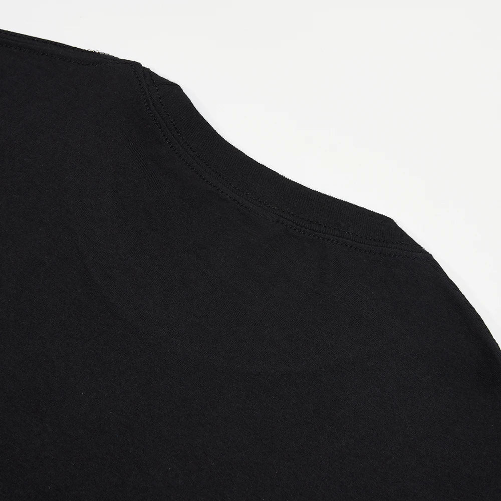 Close-up of a black sleeve on a white background
